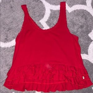 Red hollister tank with ruffle bottom.